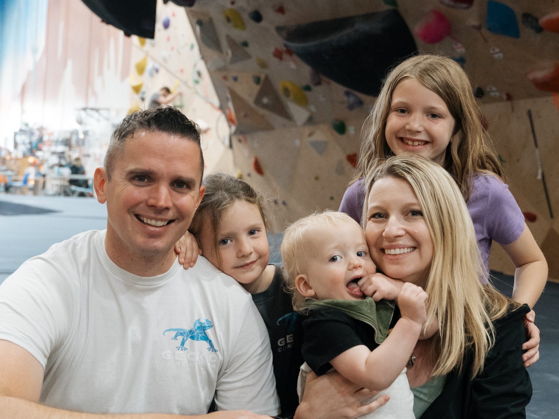 Chris, his wife, and their three kids at Gecko Climbing Gym