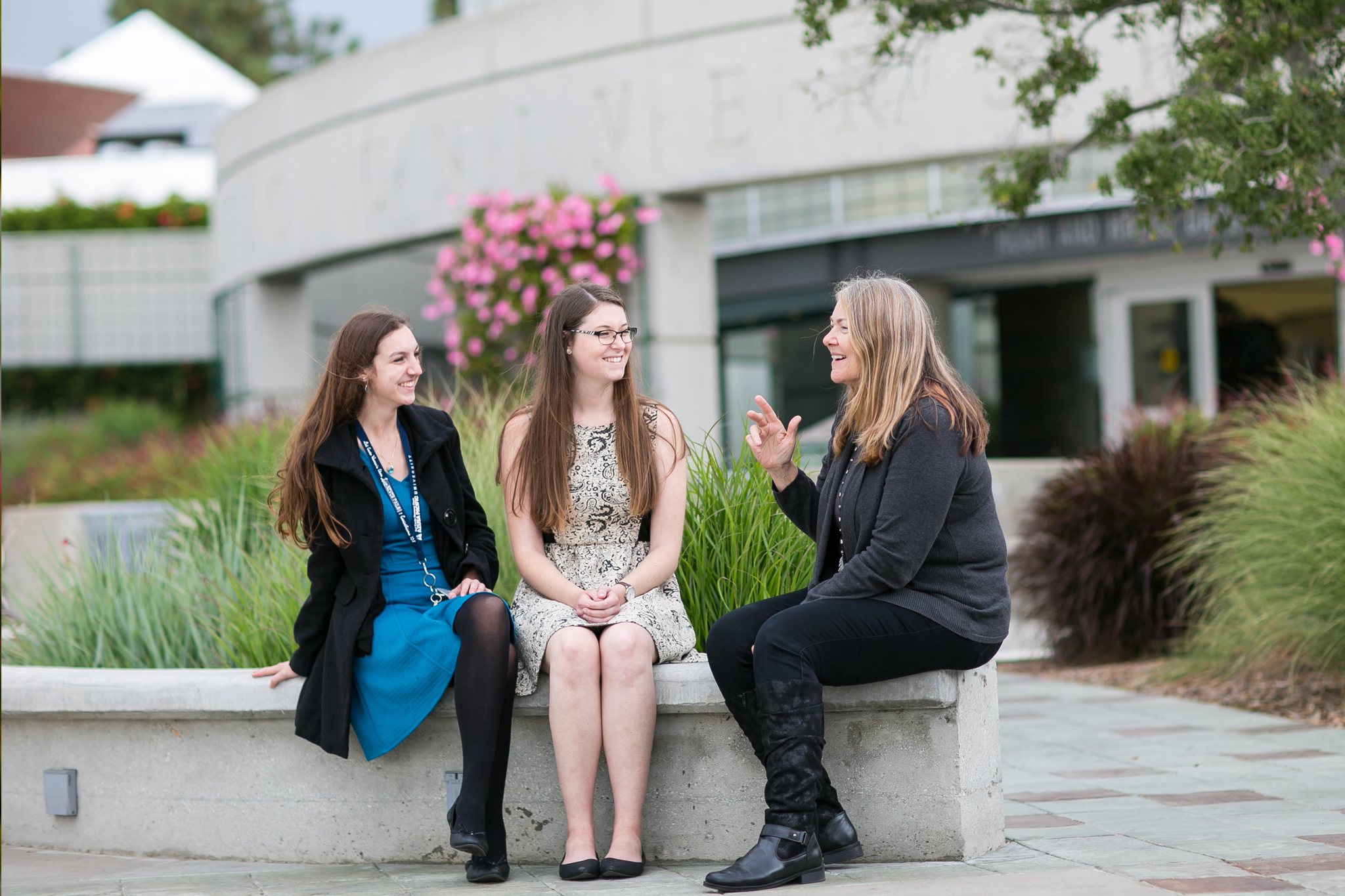 professor talking to students outside