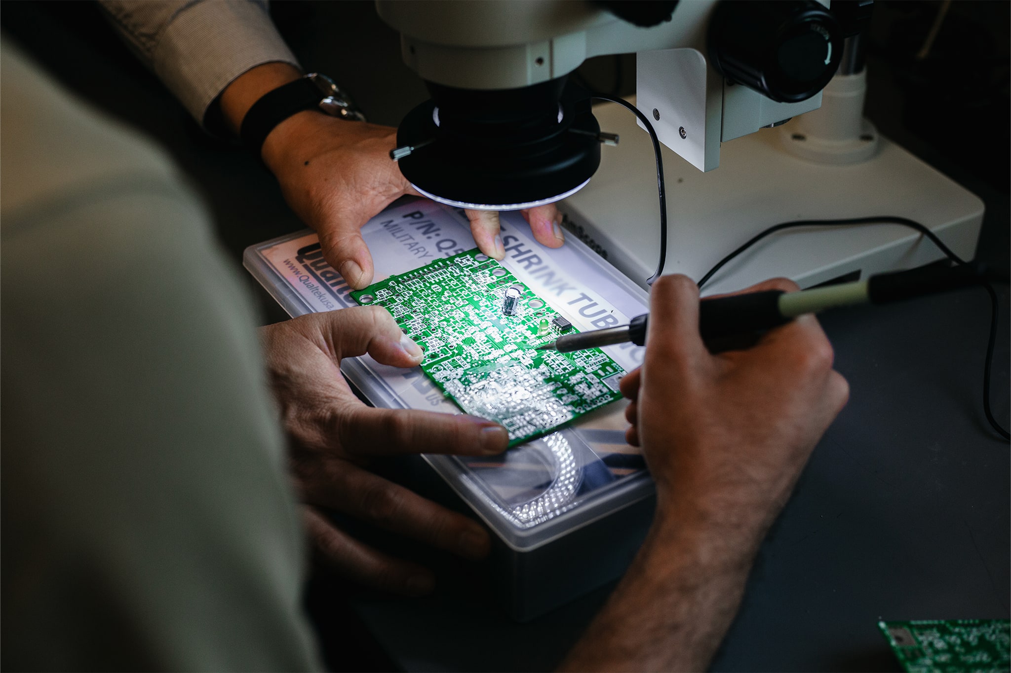 Students working with computer chip
