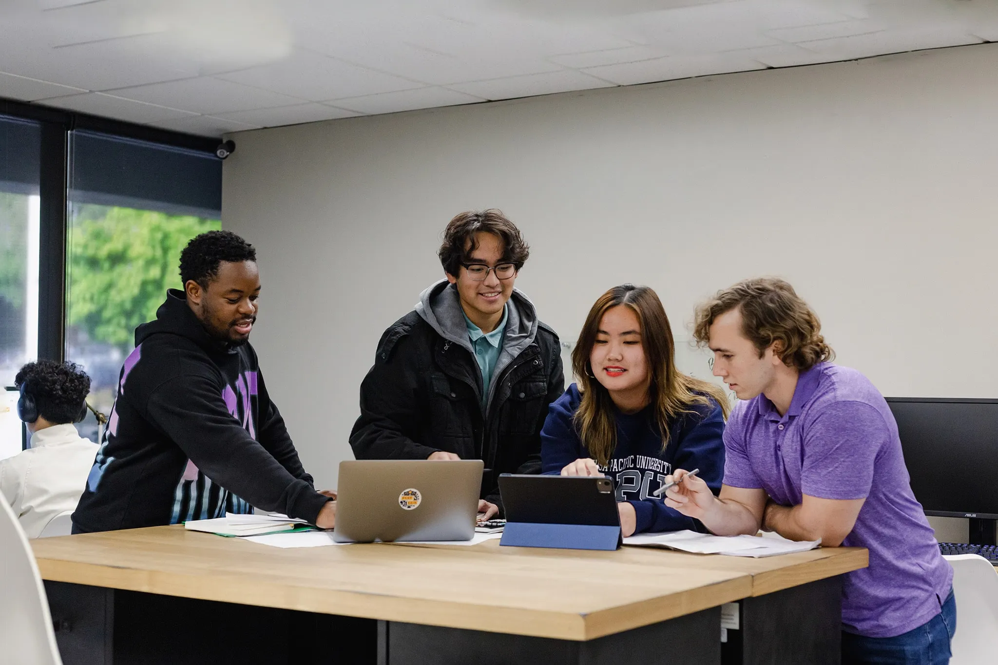 professor and students hanging out at the segerstrom science building
