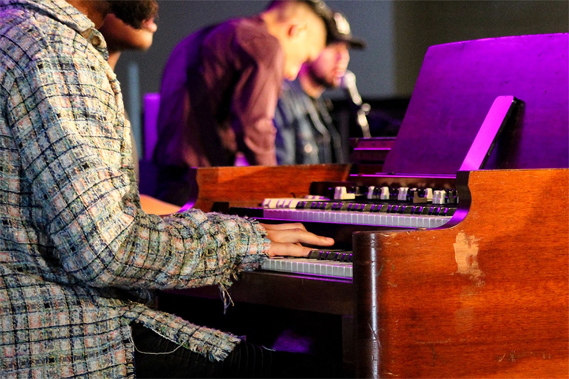 student playing the piano
