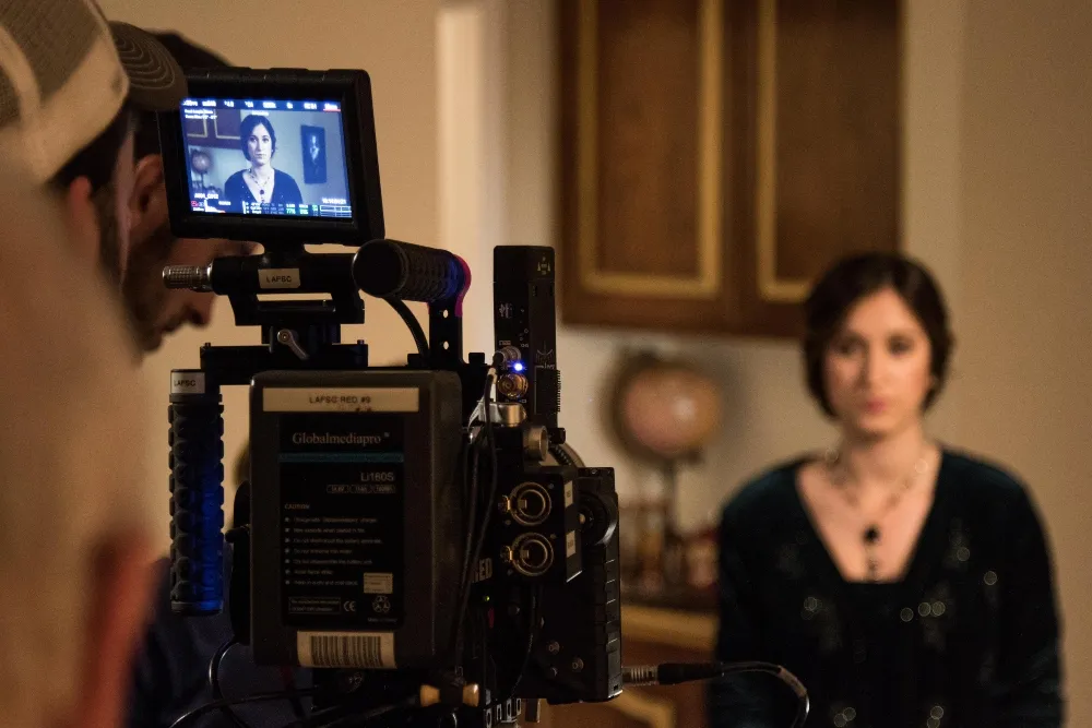 Camera focusing on woman subject