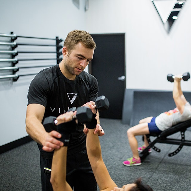 Matt spotting dumbbell workout