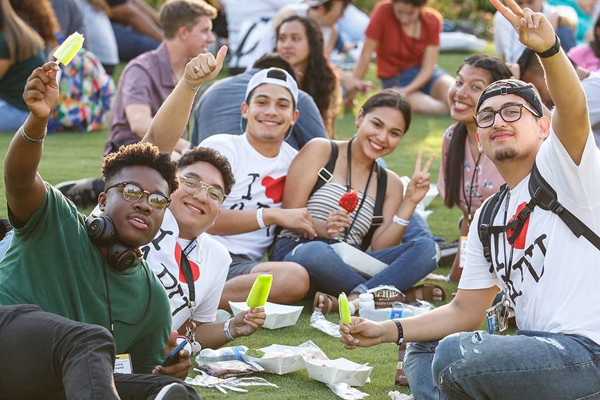 students on apu’s lawn having fun